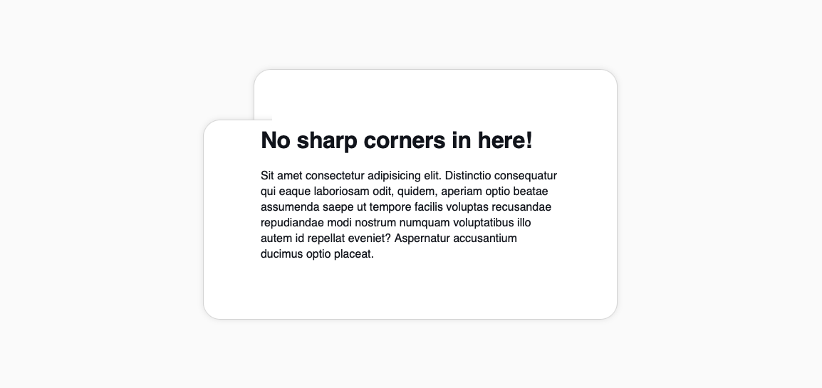 A card with a cutout with the top right and bottom left corners rounded, intersecting.